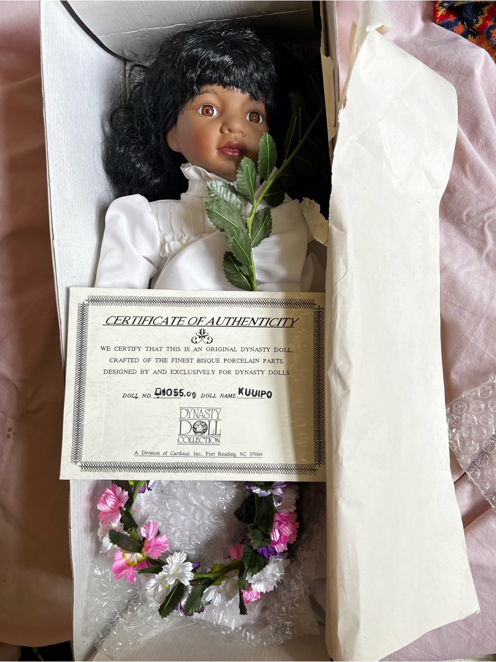 Dynasty Doll Kuipo Porcelain Doll in White Dress with Black Hair